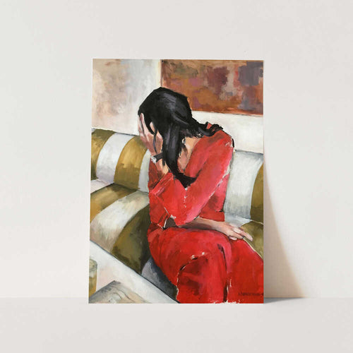 Woman In A Red Dress Sits On A Sofa PFY Art Print