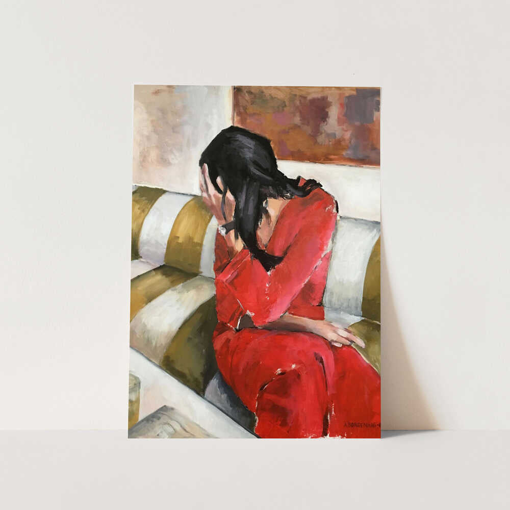 Woman In A Red Dress Sits On A Sofa PFY Art Print